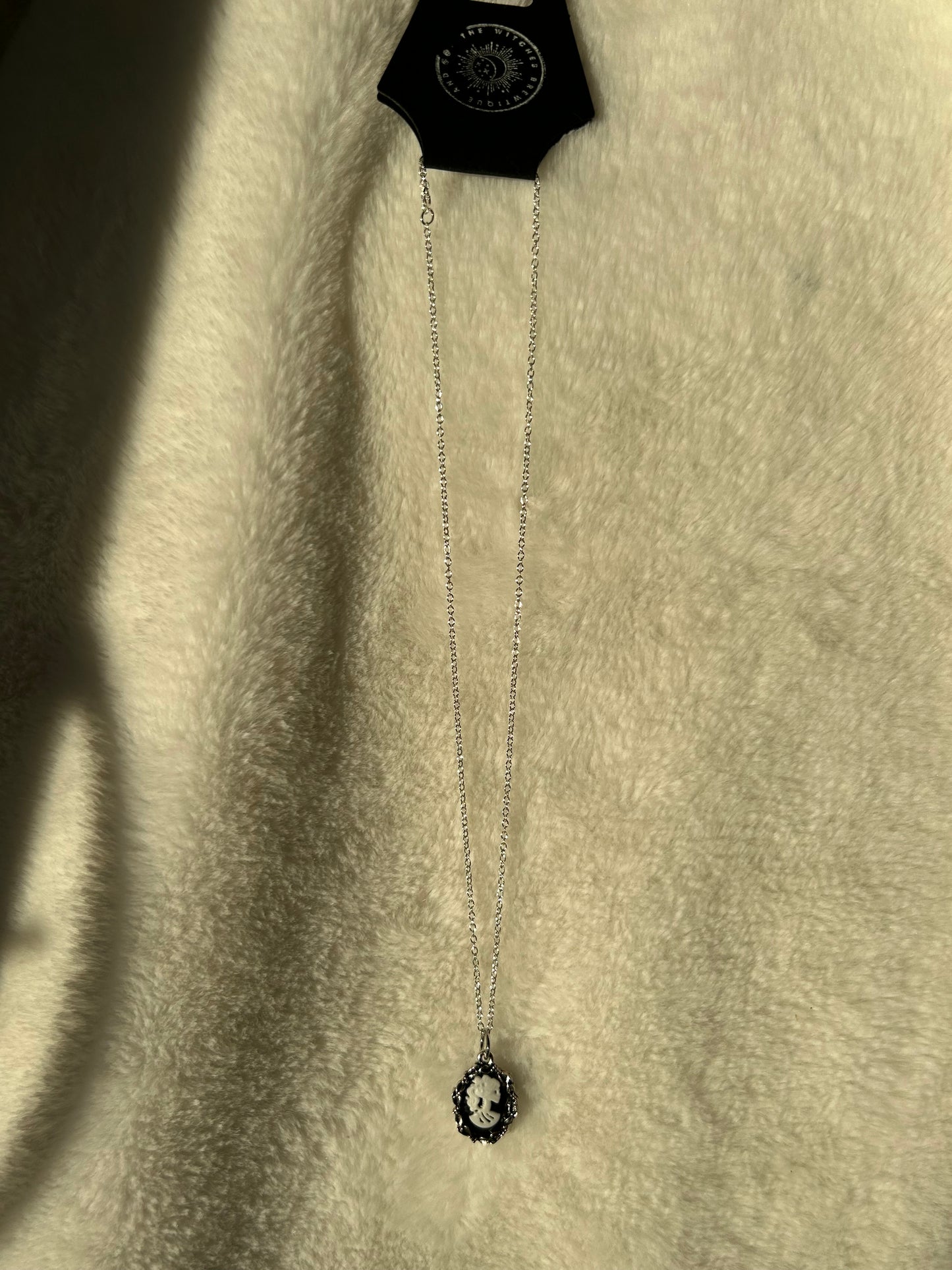 Skeleton silhouette necklace