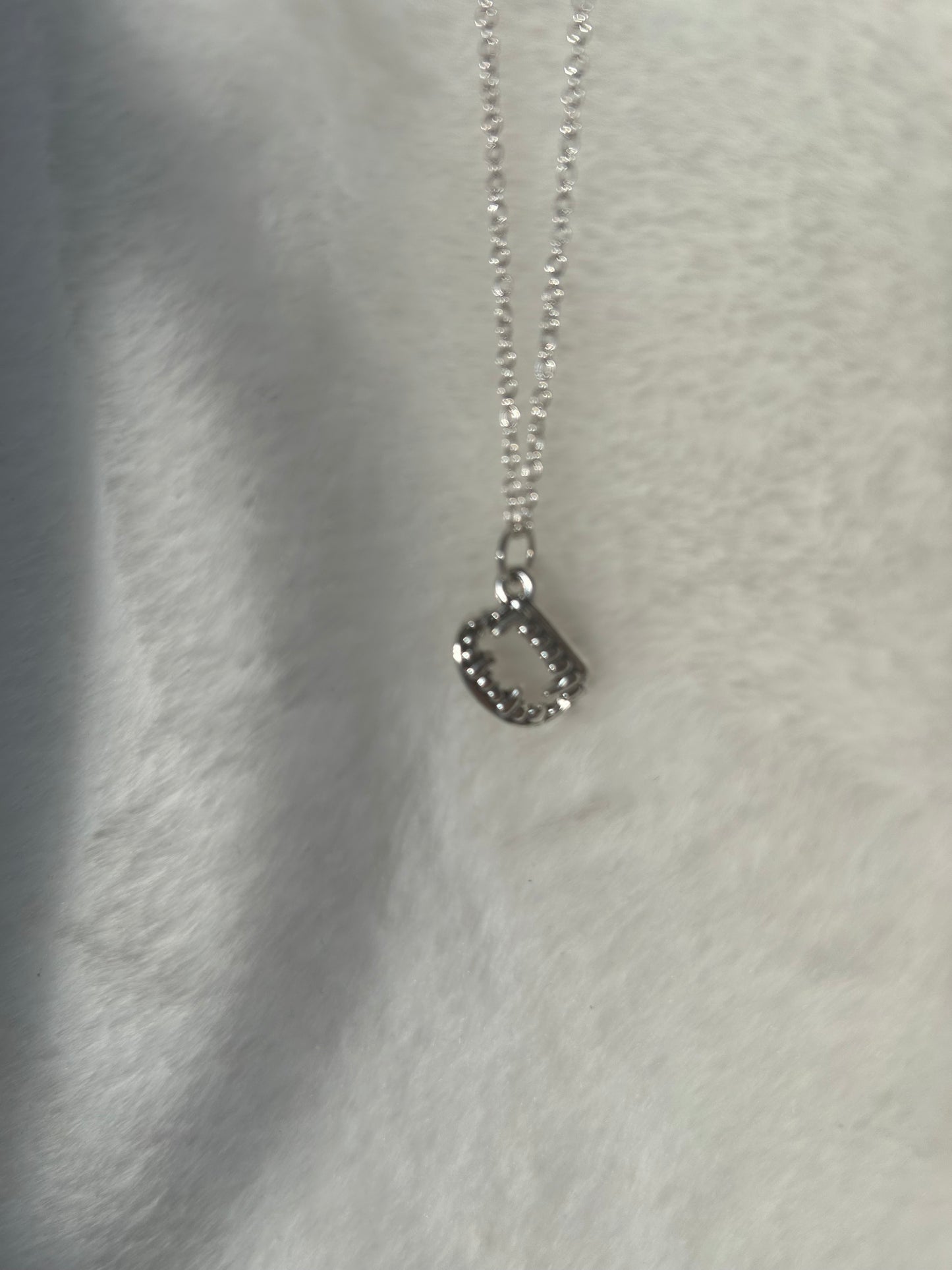 Vampire teeth necklace