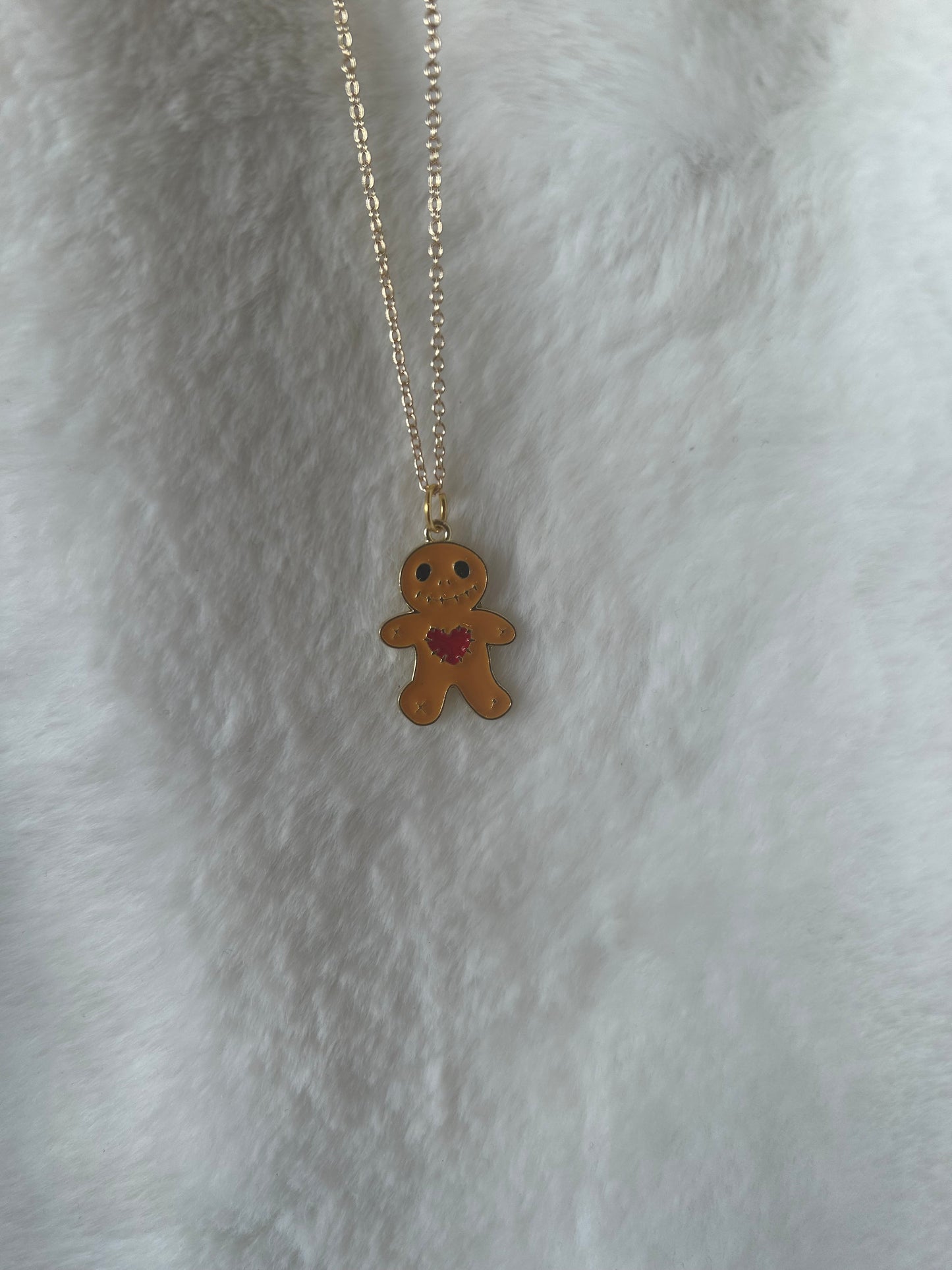 Voodoo doll necklace