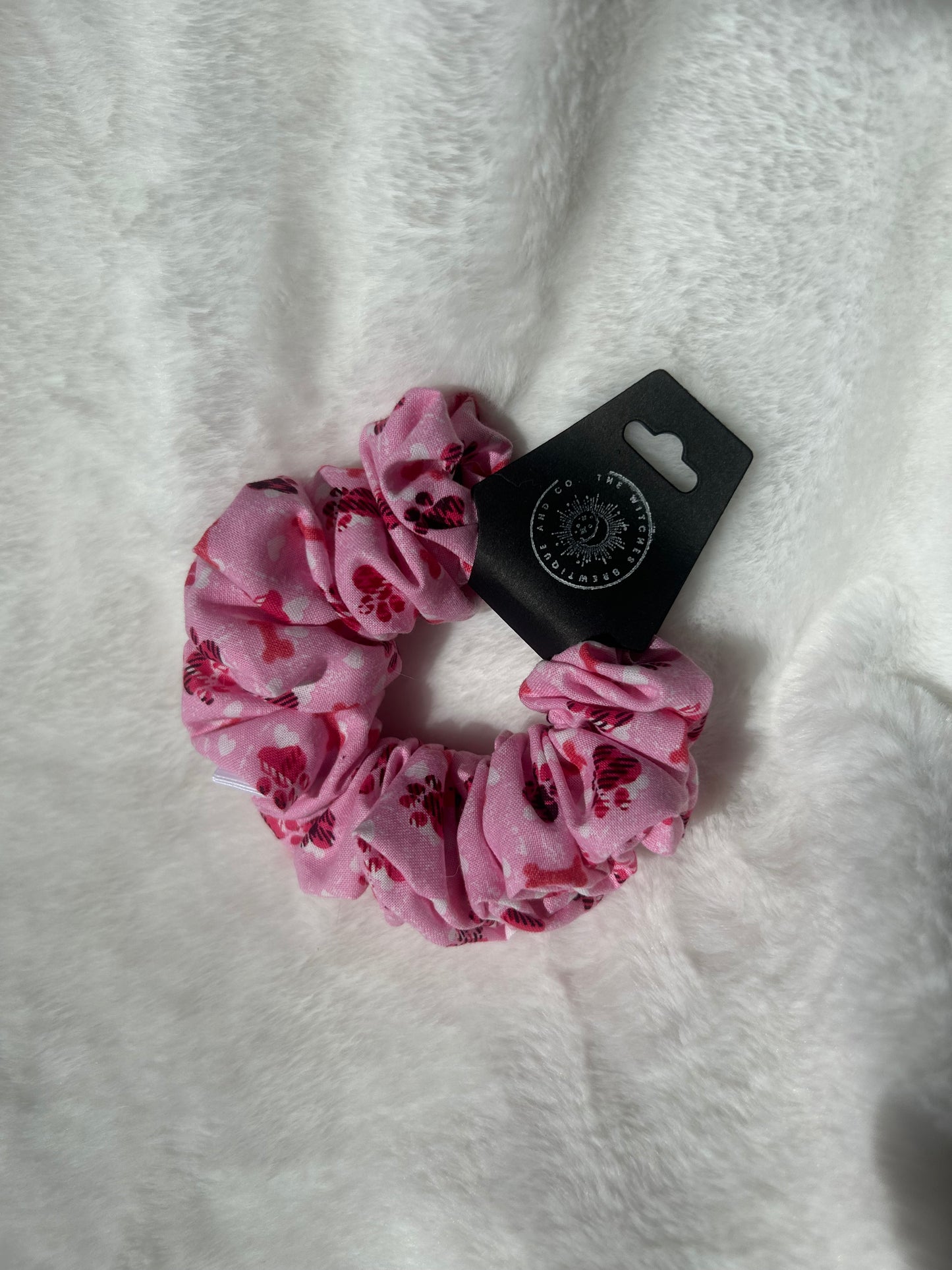 Pink paw and bones scrunchie