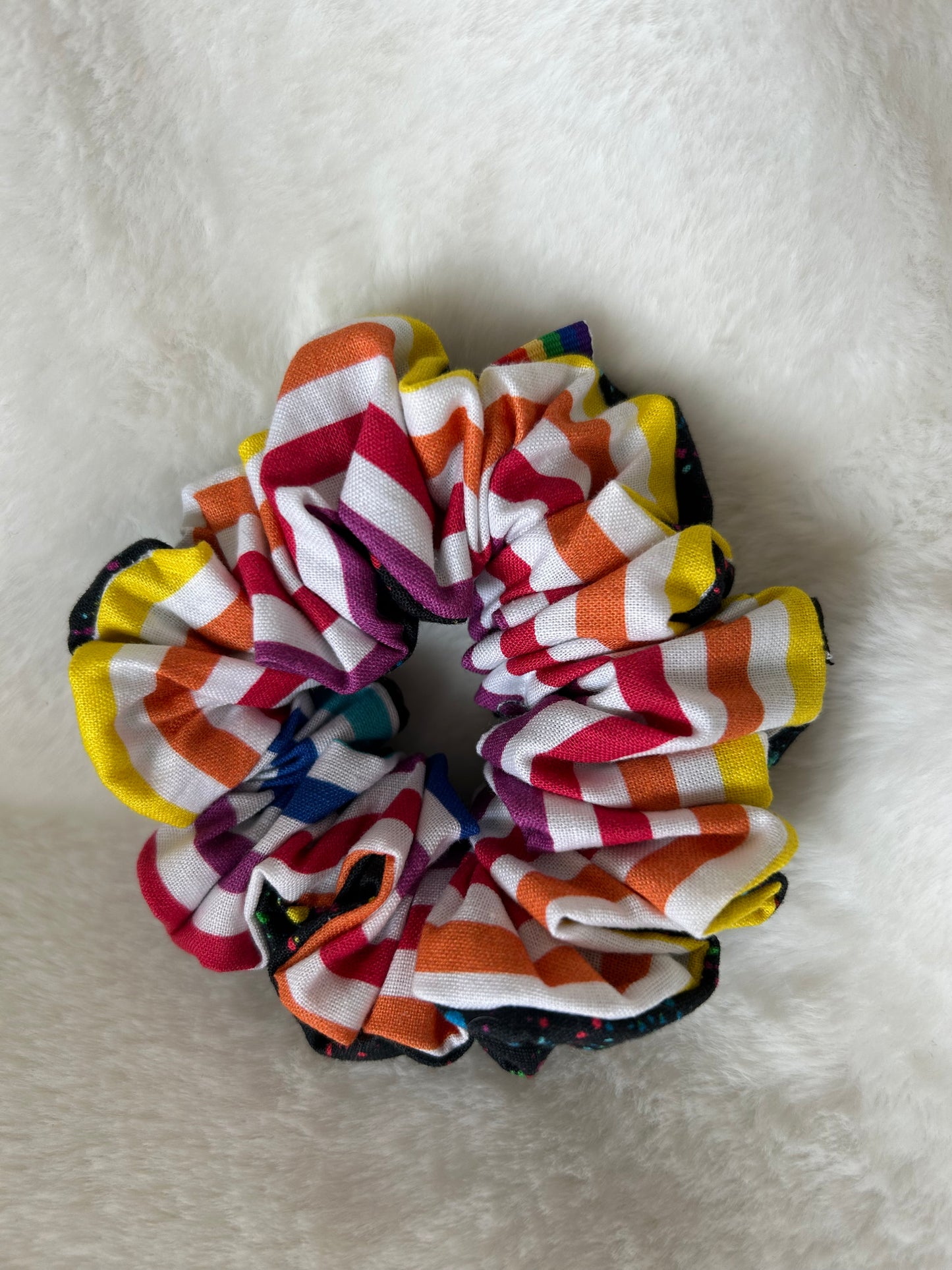 Two sided rainbow stripes and black with rainbow dot splatter scrunchie