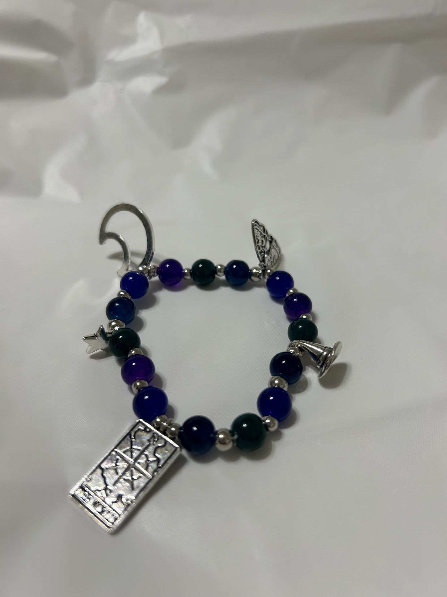 Blue and green beaded charm bracelet