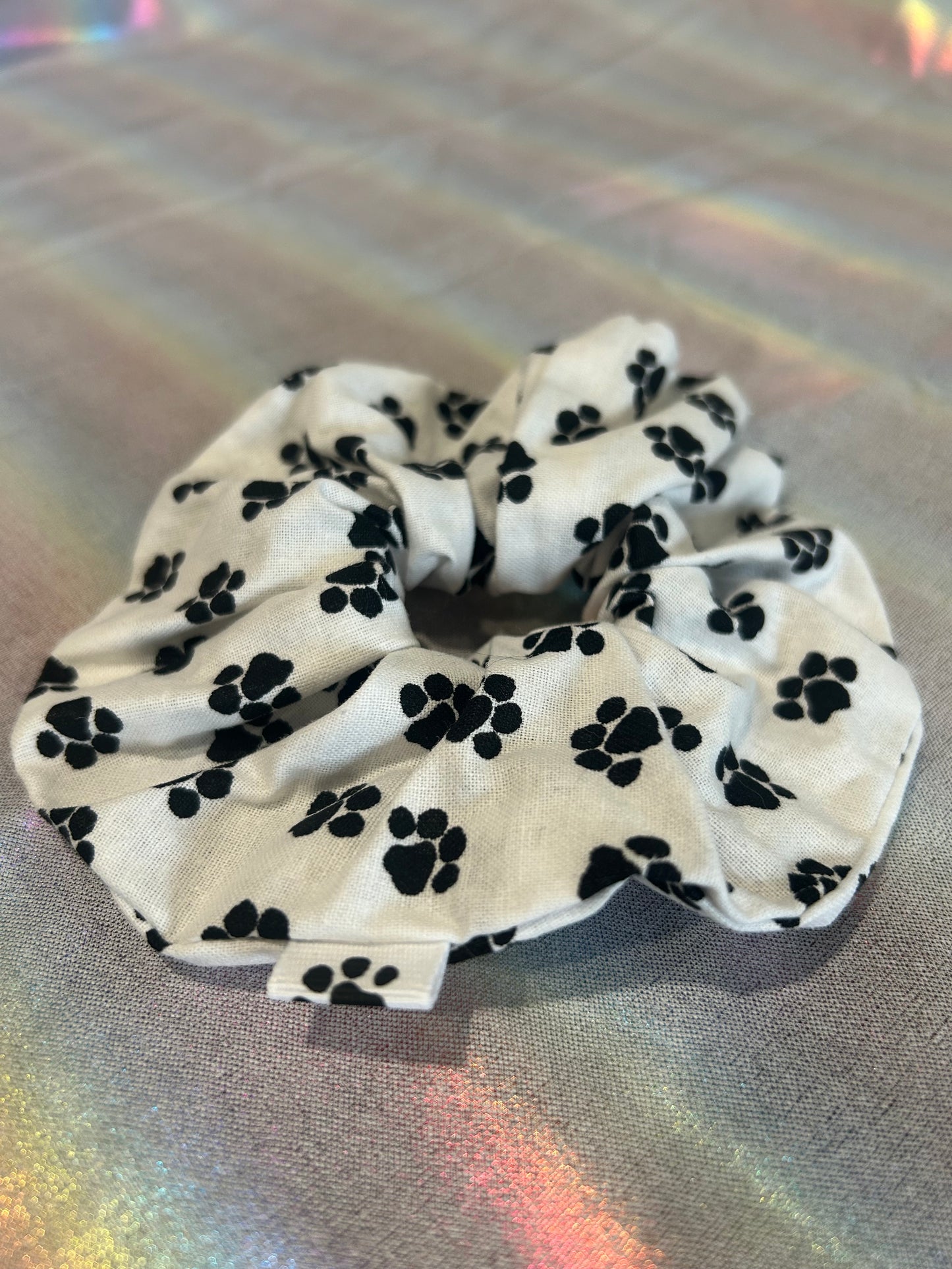 White and black paw print scrunchie