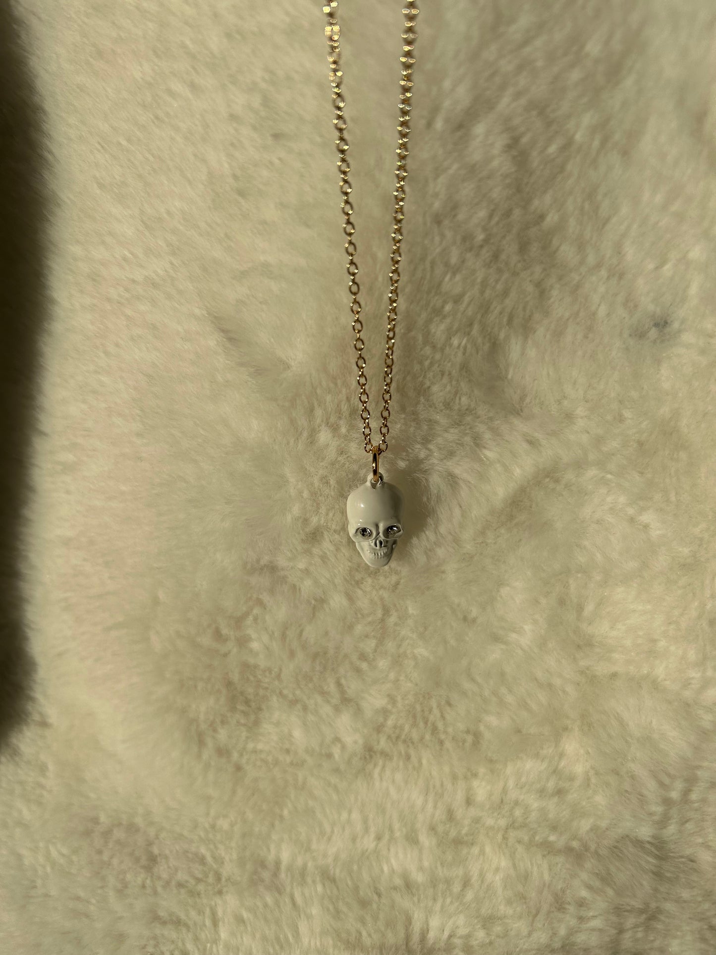 White gem skull necklace