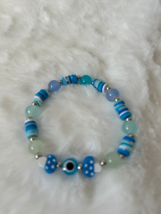 Evil eye and mushroom beaded bracelet