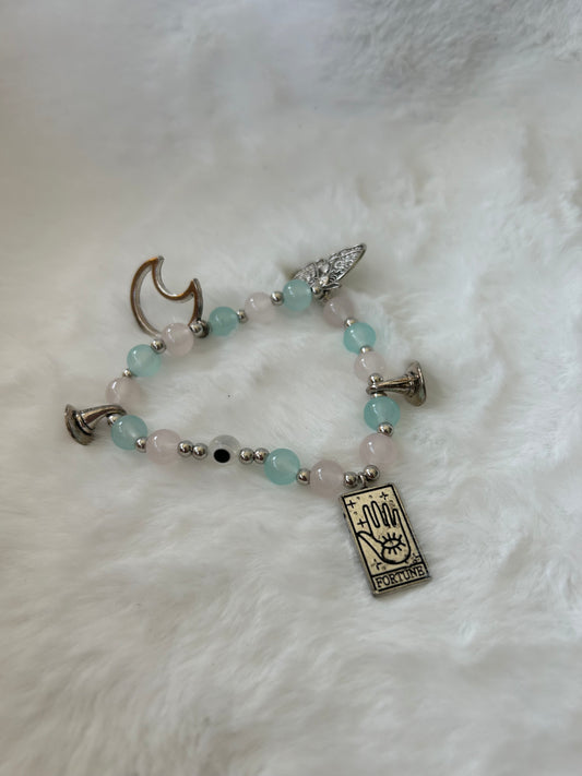 Blue and white witchy beaded charm bracelet