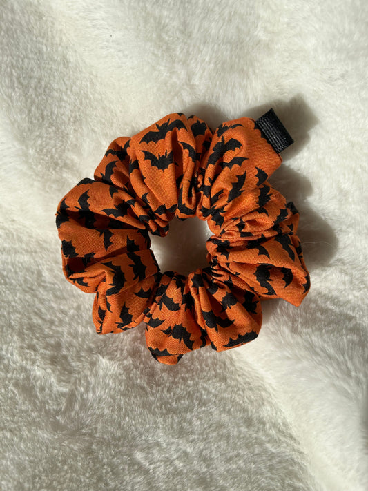 Orange and black bat scrunchie