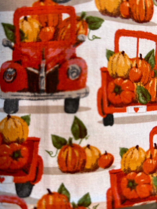 Little orange truck hauling some pumpkins scrunchie