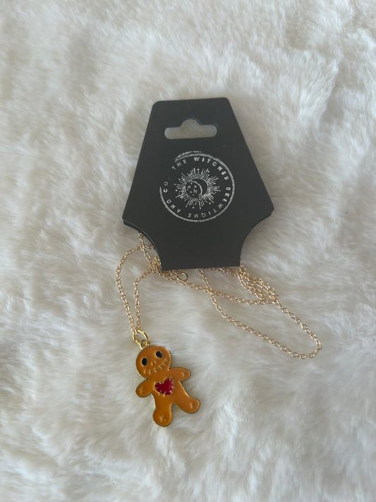 Voodoo doll necklace