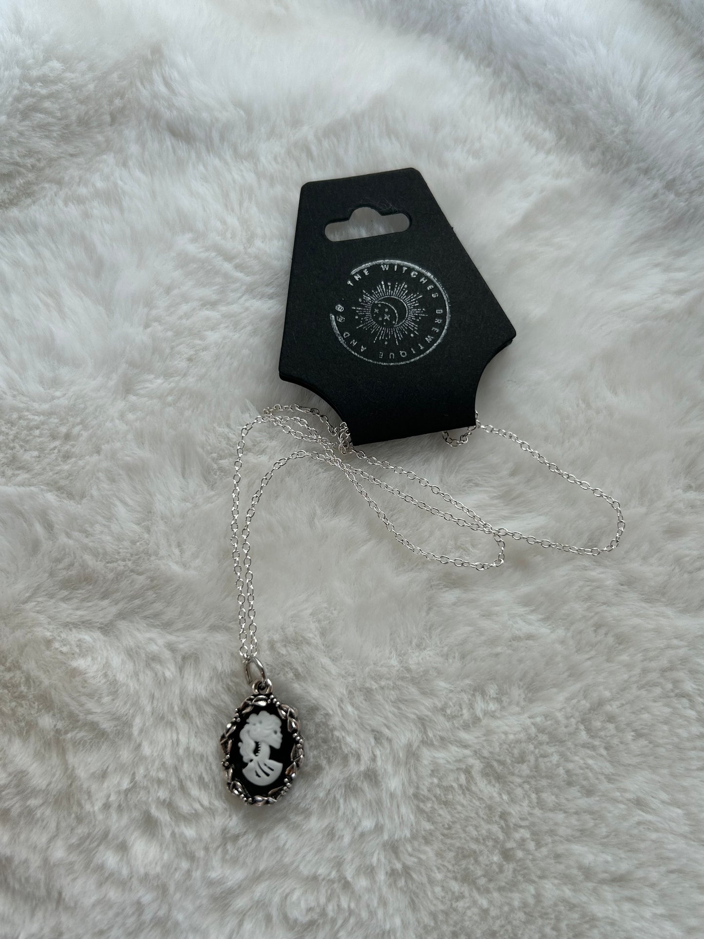 Skeleton silhouette necklace