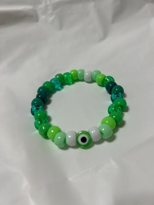 Green beaded evil eye bracelet