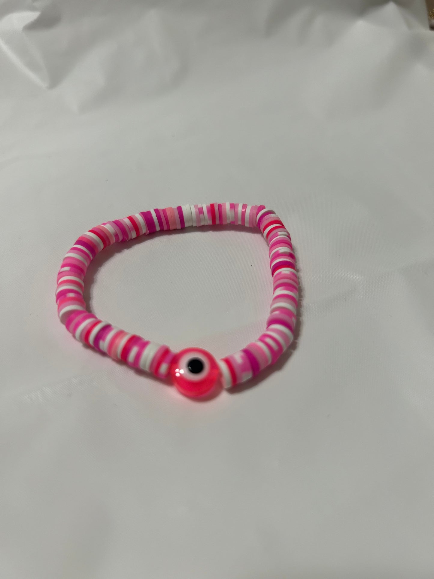 Pink evil eye clay beaded bracelet
